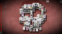 Creepy Mahjong solitaire, indie video game with dark themer by Biim Games. Skull Level.